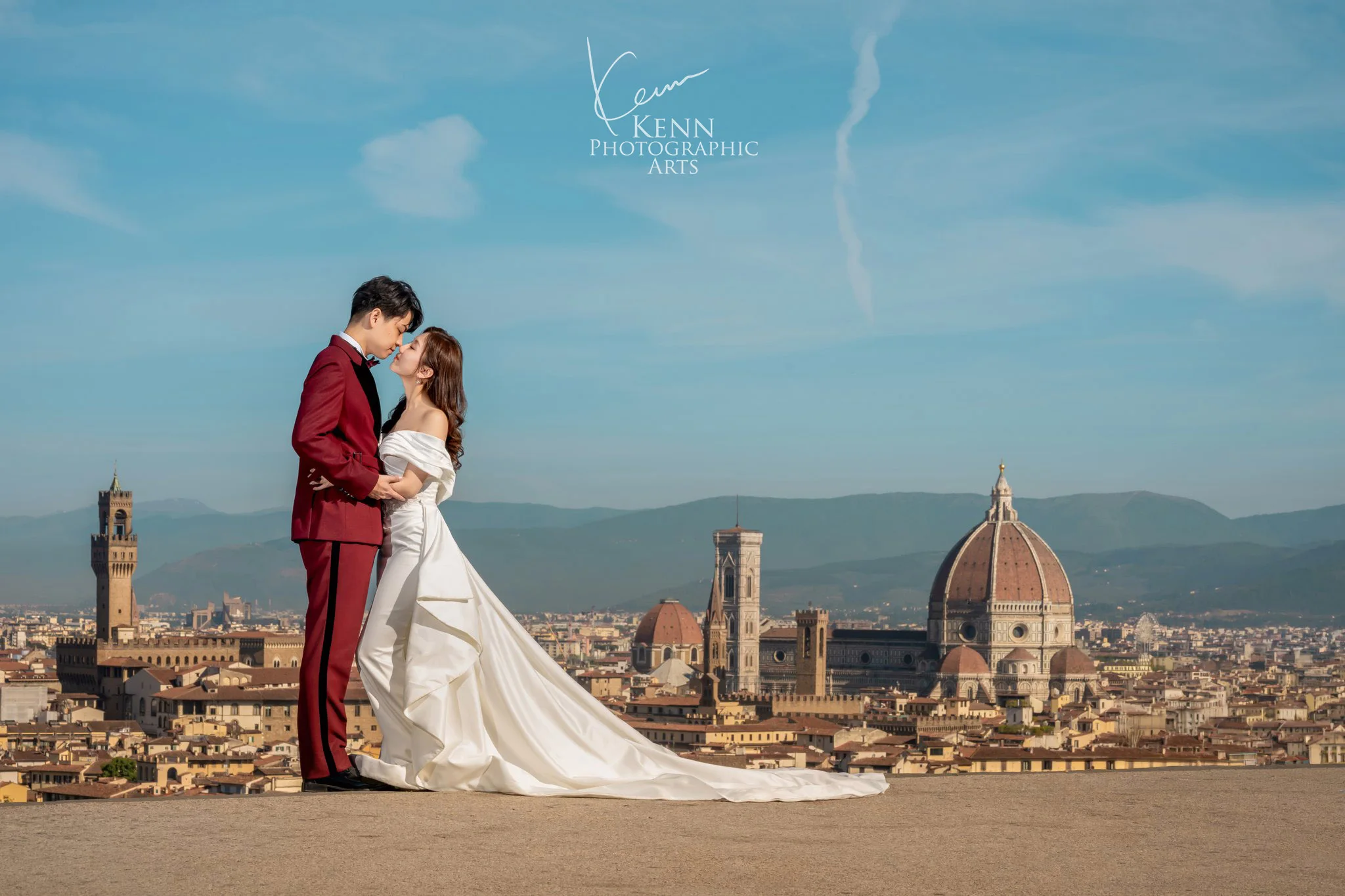 Wincy & Leo kissing at Piazzale Michelangelo above the Florence skyline and Duomo — Florence & Tuscany pre-wedding by Kenn Photographic Arts