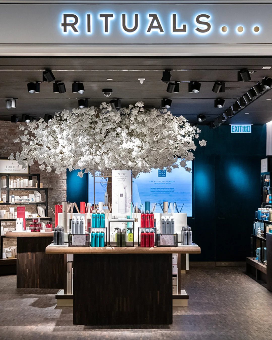 Rituals store front with illuminated sign — retail photography by Kenn Photographic Arts
