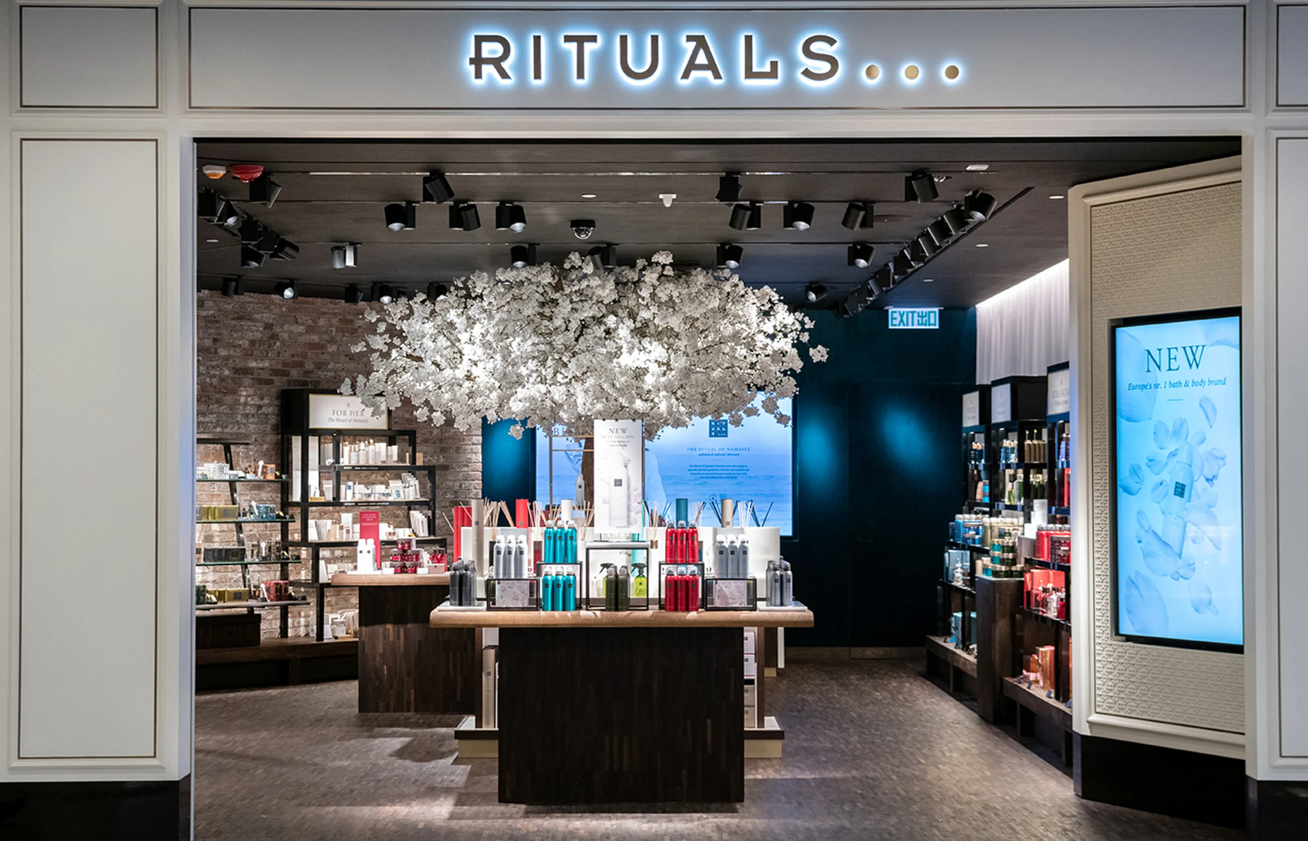 Rituals store front with illuminated sign — retail photography by Kenn Photographic Arts